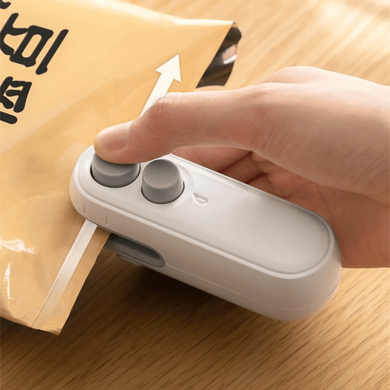 💥Mini Sealer Small Household Hand Pressure Sealer Portable Snack Plastic Bag Heat Sealing Machine -Remifa®